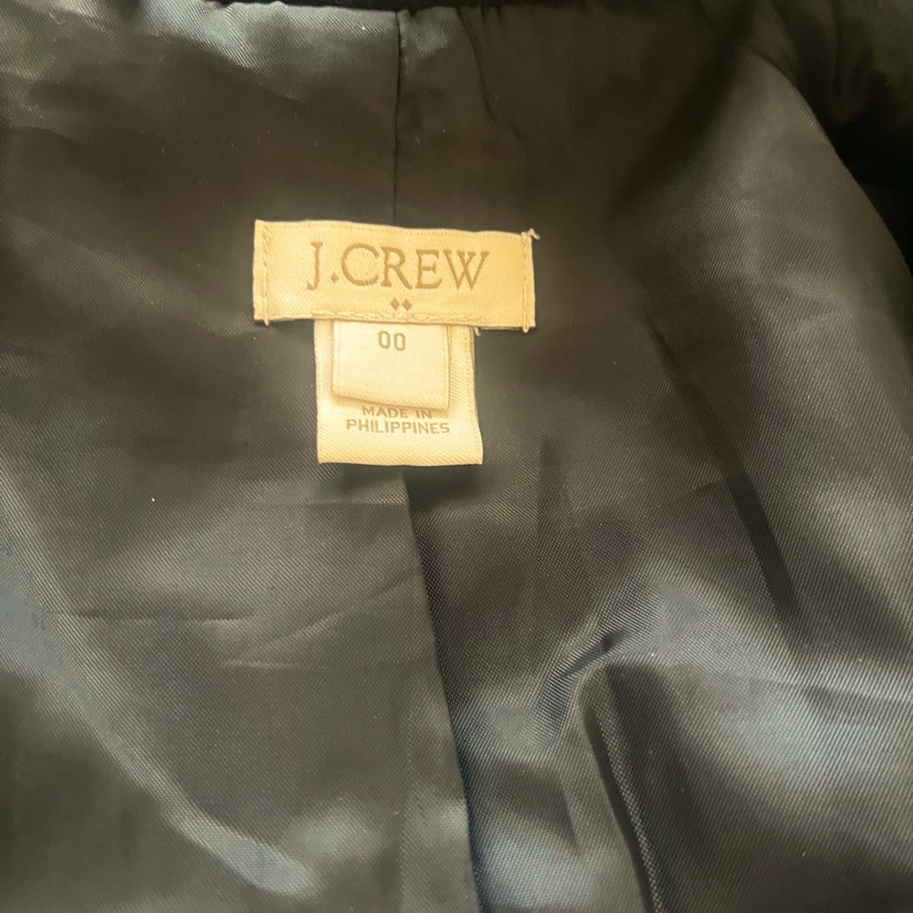 J Crew black pea coat in good condition.